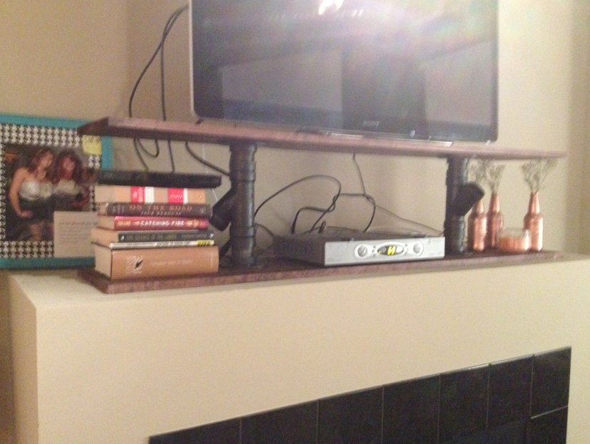 VOILA! A new DIY industrial looking TV Stand!